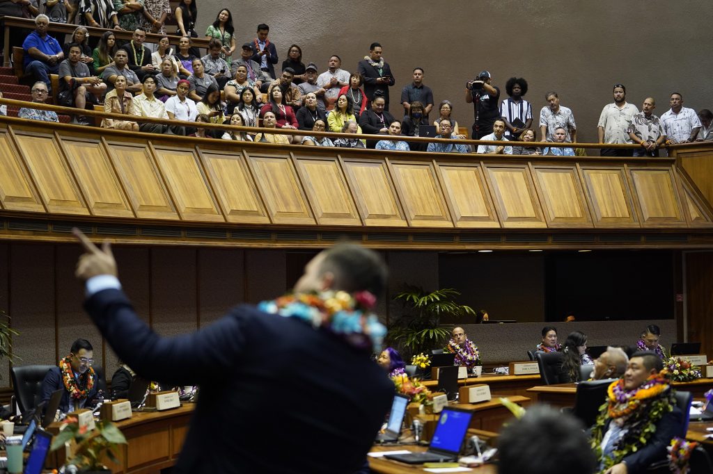 The House of Representatives majority whip Chris Todd recognizes people in the gallery during the opening of the legislative session Wednesday, Jan. 17, 2024, in Honolulu. (Kevin Fujii/Civil Beat/2024)