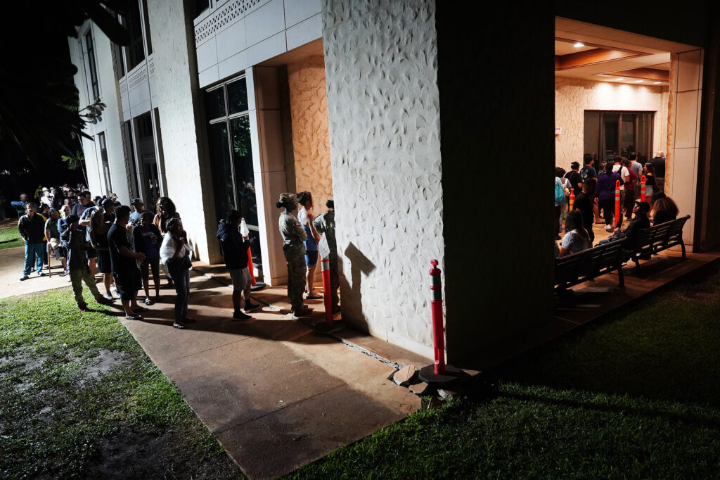 The final turn before getting into he hallway leading to the voting machines at Kapolei Hale is deceptively shorter than the line which wraps around the building and then snakes around itself Tuesday, Nov. 5, 2024, in Kapolei. (Kevin Fujii/Civil Beat/2024)