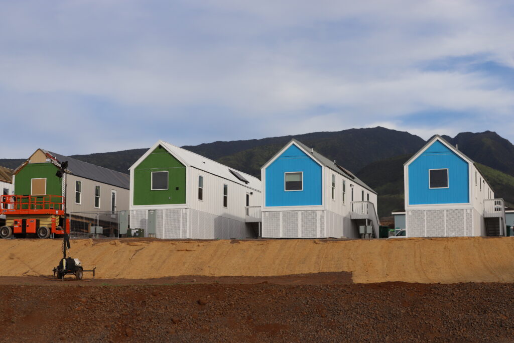 The green unit in the middle is the home occupied by the Folaumoela family, the first residents of FEMA Kilohana Temporary Group Housing. (Léo Azambuja/Civil Beat/2024)